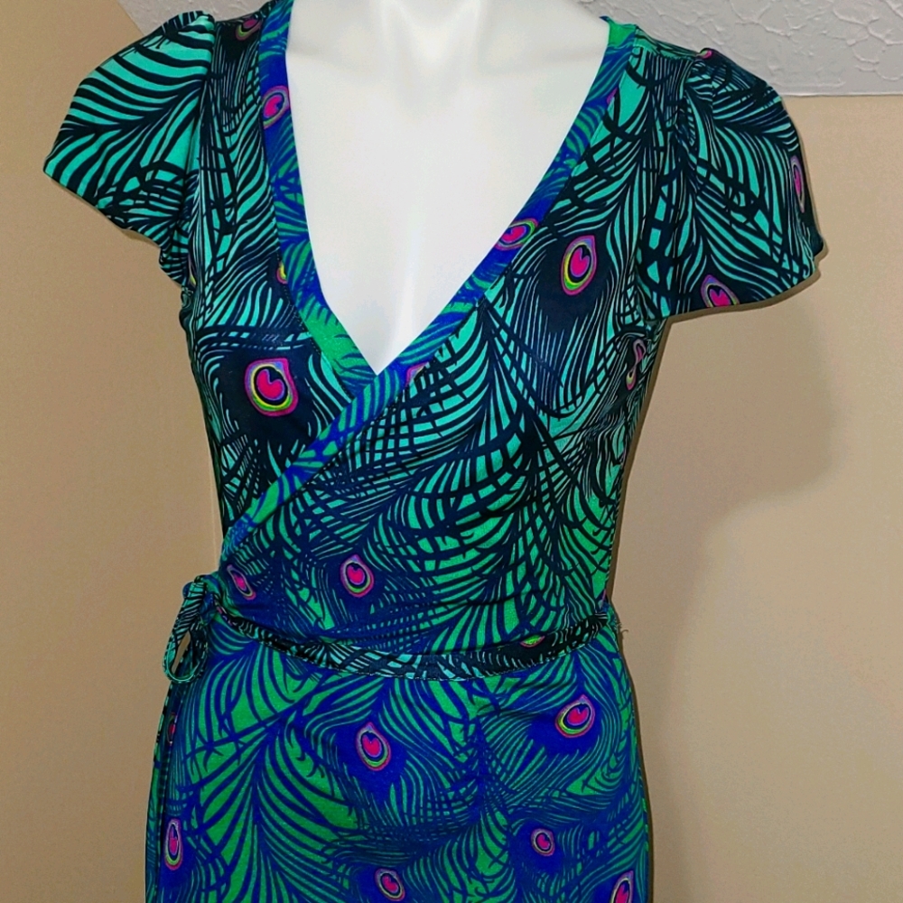 Bright peacock feather wrap dress